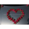 Dunkelpink Rosenschmuck mit Saugnapfen vor Hochzeitsauto